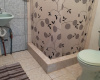 Private bathroom with hot water shower