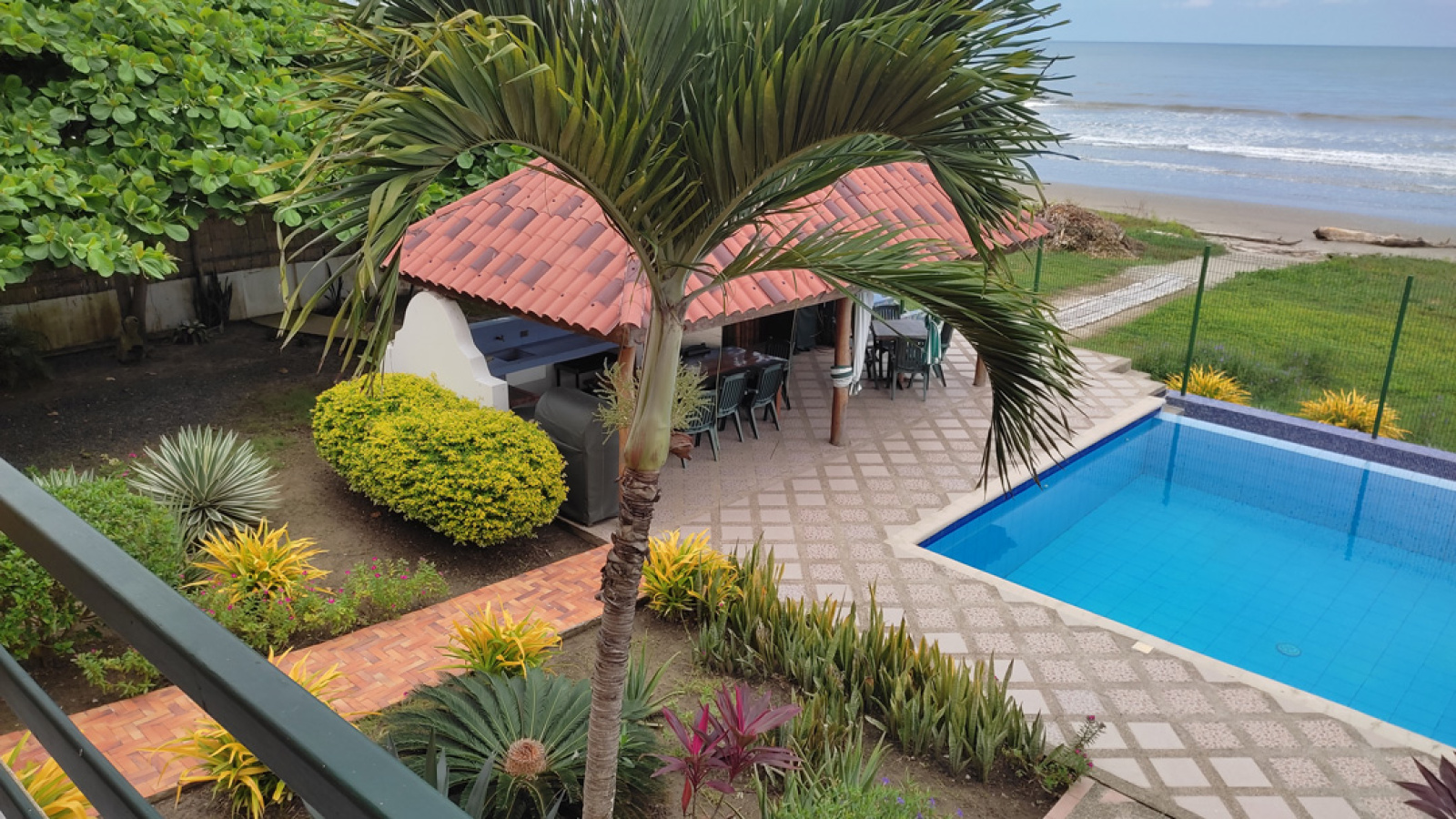 View of the pool and BBQ area from your balcony