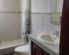 One of 2 bathrooms