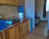 View into kitchen and bedroom